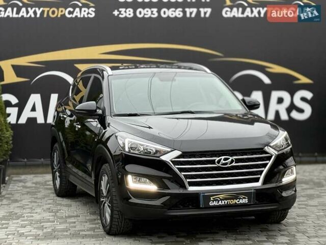 Черный Хендай Туксон, объемом двигателя 2 л и пробегом 55 тыс. км за 22300 $, фото 9 на Automoto.ua