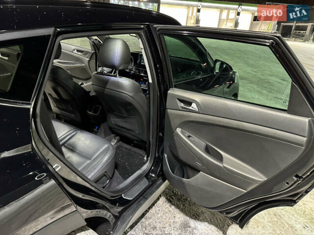 Черный Хендай Туксон, объемом двигателя 2 л и пробегом 86 тыс. км за 31000 $, фото 10 на Automoto.ua