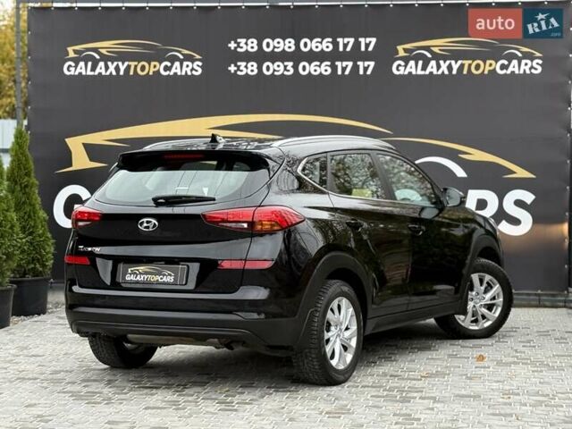 Черный Хендай Туксон, объемом двигателя 2 л и пробегом 77 тыс. км за 21500 $, фото 22 на Automoto.ua