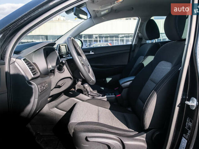 Черный Хендай Туксон, объемом двигателя 2 л и пробегом 88 тыс. км за 23000 $, фото 17 на Automoto.ua