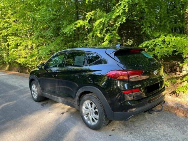 Черный Хендай Туксон, объемом двигателя 2 л и пробегом 89 тыс. км за 12400 $, фото 2 на Automoto.ua