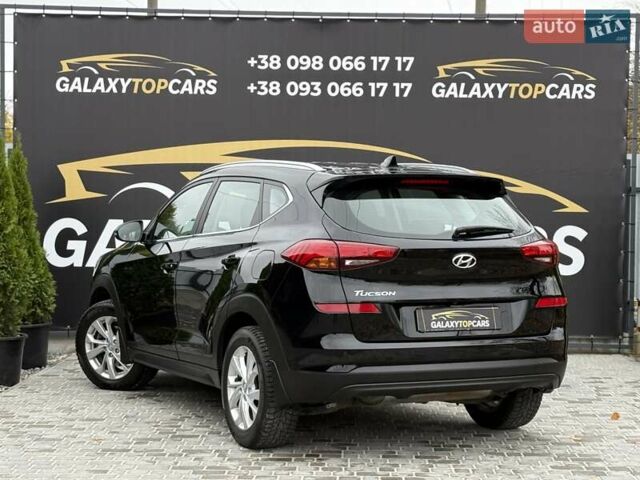 Черный Хендай Туксон, объемом двигателя 2 л и пробегом 77 тыс. км за 21500 $, фото 21 на Automoto.ua