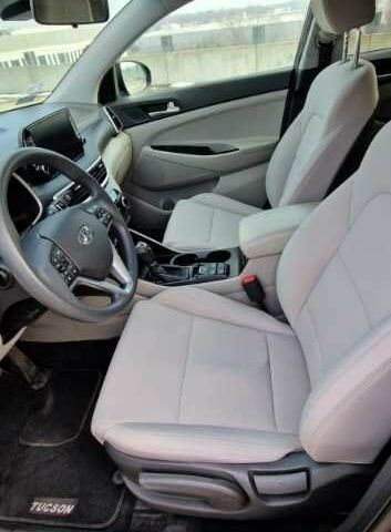 Черный Хендай Туксон, объемом двигателя 2 л и пробегом 76 тыс. км за 11200 $, фото 10 на Automoto.ua