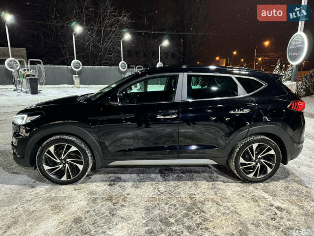 Черный Хендай Туксон, объемом двигателя 2 л и пробегом 86 тыс. км за 31000 $, фото 7 на Automoto.ua