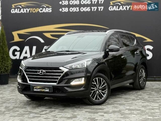 Черный Хендай Туксон, объемом двигателя 2 л и пробегом 55 тыс. км за 22300 $, фото 1 на Automoto.ua