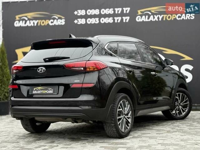 Черный Хендай Туксон, объемом двигателя 2 л и пробегом 55 тыс. км за 22300 $, фото 20 на Automoto.ua