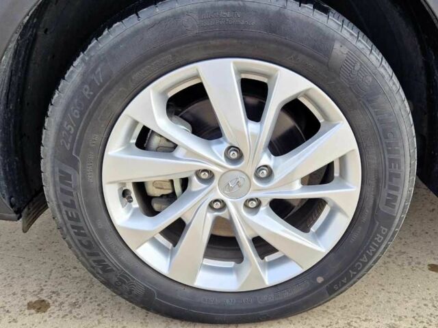 Черный Хендай Туксон, объемом двигателя 2 л и пробегом 76 тыс. км за 11200 $, фото 8 на Automoto.ua