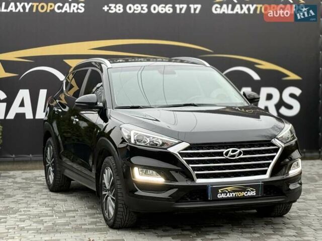 Черный Хендай Туксон, объемом двигателя 2 л и пробегом 55 тыс. км за 22300 $, фото 8 на Automoto.ua