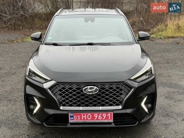 Черный Хендай Туксон, объемом двигателя 2 л и пробегом 98 тыс. км за 25900 $, фото 7 на Automoto.ua