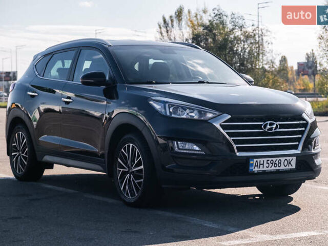 Черный Хендай Туксон, объемом двигателя 2 л и пробегом 88 тыс. км за 23000 $, фото 1 на Automoto.ua