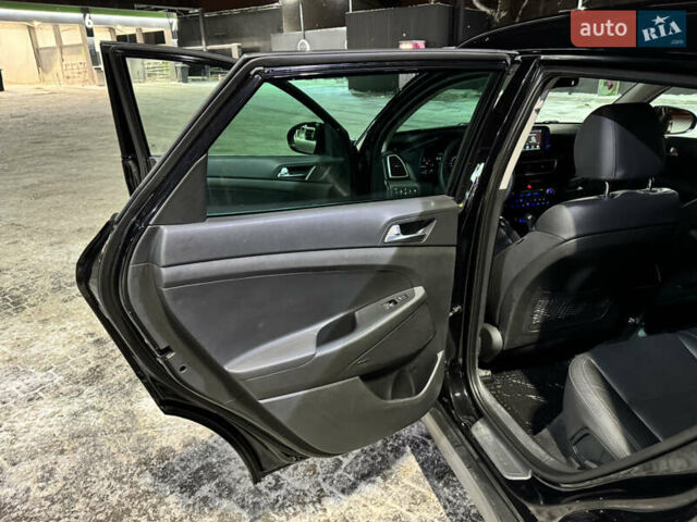 Черный Хендай Туксон, объемом двигателя 2 л и пробегом 86 тыс. км за 31000 $, фото 11 на Automoto.ua