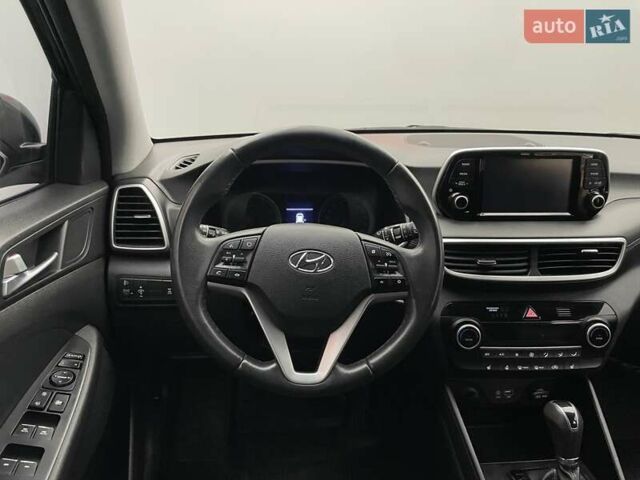 Черный Хендай Туксон, объемом двигателя 2 л и пробегом 100 тыс. км за 22424 $, фото 12 на Automoto.ua