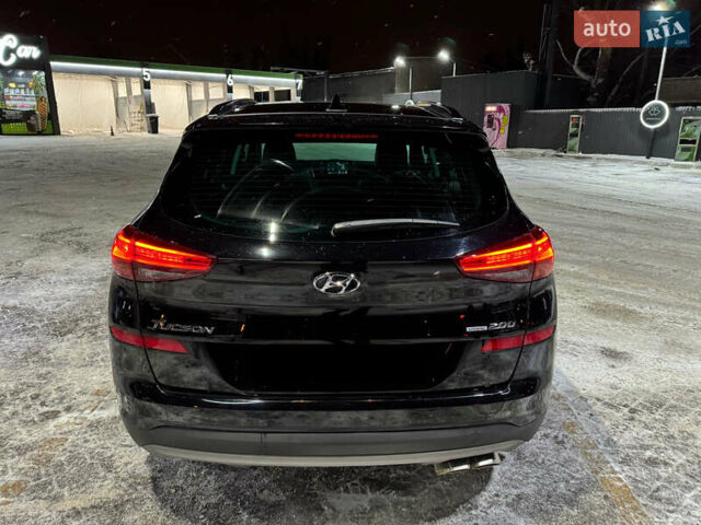 Черный Хендай Туксон, объемом двигателя 2 л и пробегом 86 тыс. км за 31000 $, фото 1 на Automoto.ua