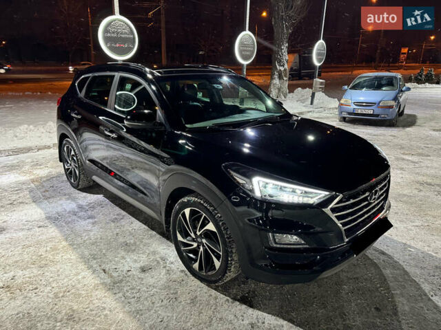 Черный Хендай Туксон, объемом двигателя 2 л и пробегом 86 тыс. км за 31000 $, фото 2 на Automoto.ua