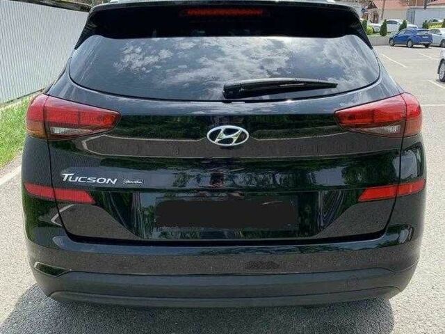 Черный Хендай Туксон, объемом двигателя 2 л и пробегом 129 тыс. км за 16500 $, фото 3 на Automoto.ua