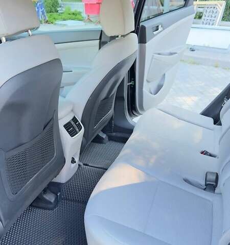 Черный Хендай Туксон, объемом двигателя 2.4 л и пробегом 69 тыс. км за 22000 $, фото 7 на Automoto.ua