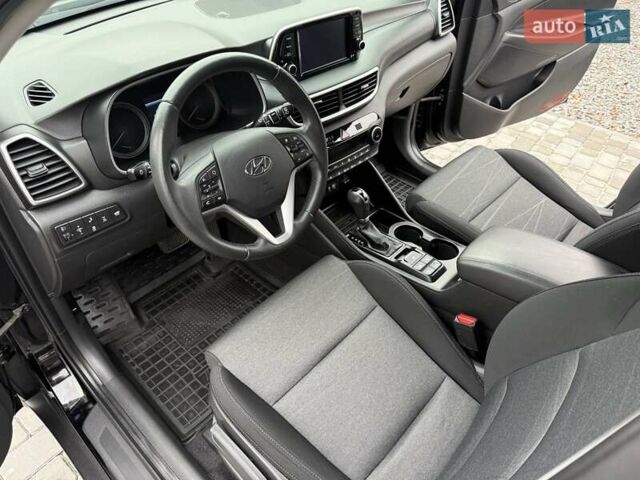 Черный Хендай Туксон, объемом двигателя 2 л и пробегом 55 тыс. км за 22300 $, фото 28 на Automoto.ua