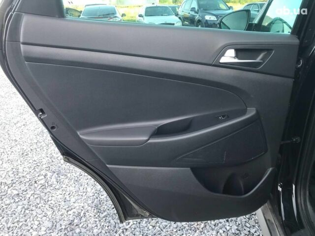 Черный Хендай Туксон, объемом двигателя 2 л и пробегом 87 тыс. км за 20790 $, фото 14 на Automoto.ua