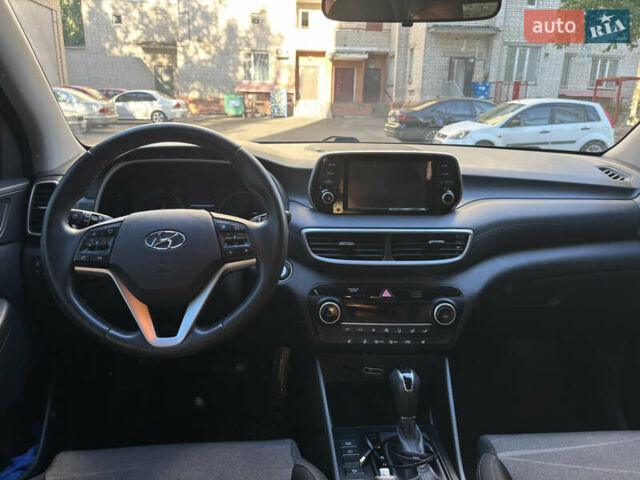 Черный Хендай Туксон, объемом двигателя 2 л и пробегом 74 тыс. км за 22600 $, фото 9 на Automoto.ua