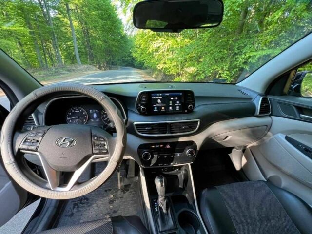 Черный Хендай Туксон, объемом двигателя 2 л и пробегом 89 тыс. км за 12400 $, фото 3 на Automoto.ua