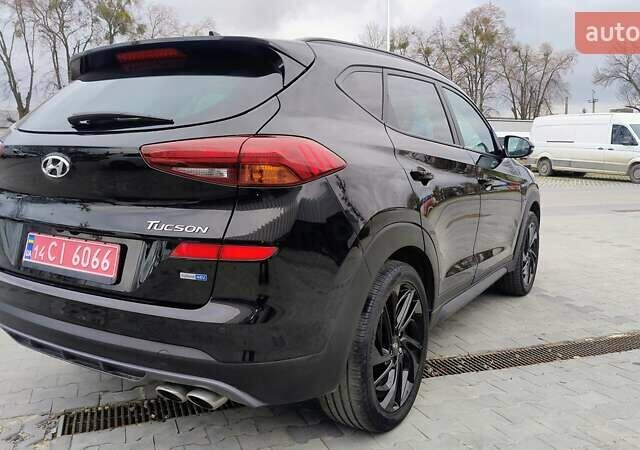 Черный Хендай Туксон, объемом двигателя 1.6 л и пробегом 183 тыс. км за 24300 $, фото 14 на Automoto.ua