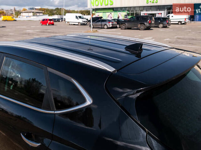 Черный Хендай Туксон, объемом двигателя 2 л и пробегом 88 тыс. км за 23000 $, фото 11 на Automoto.ua