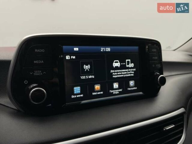 Черный Хендай Туксон, объемом двигателя 2 л и пробегом 100 тыс. км за 22424 $, фото 17 на Automoto.ua