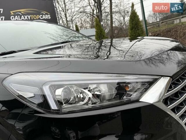 Черный Хендай Туксон, объемом двигателя 2 л и пробегом 55 тыс. км за 22300 $, фото 12 на Automoto.ua