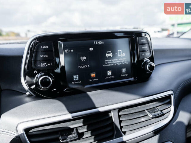 Черный Хендай Туксон, объемом двигателя 2 л и пробегом 88 тыс. км за 23000 $, фото 14 на Automoto.ua