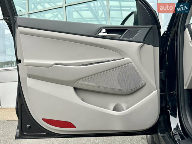 Черный Хендай Туксон, объемом двигателя 2 л и пробегом 47 тыс. км за 20990 $, фото 22 на Automoto.ua