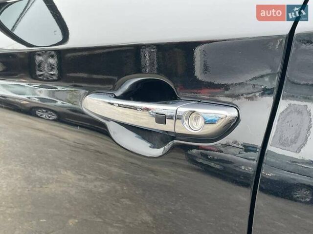 Черный Хендай Туксон, объемом двигателя 2.36 л и пробегом 137 тыс. км за 21990 $, фото 14 на Automoto.ua