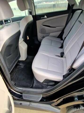 Черный Хендай Туксон, объемом двигателя 2 л и пробегом 76 тыс. км за 11200 $, фото 11 на Automoto.ua