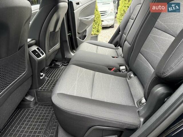 Черный Хендай Туксон, объемом двигателя 2 л и пробегом 55 тыс. км за 22300 $, фото 34 на Automoto.ua