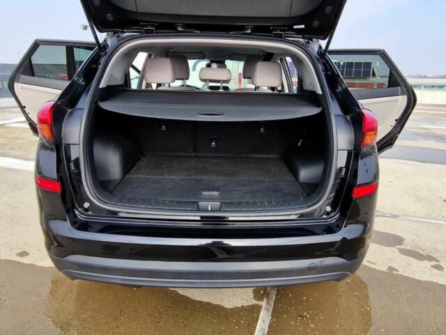 Черный Хендай Туксон, объемом двигателя 2 л и пробегом 76 тыс. км за 11200 $, фото 12 на Automoto.ua