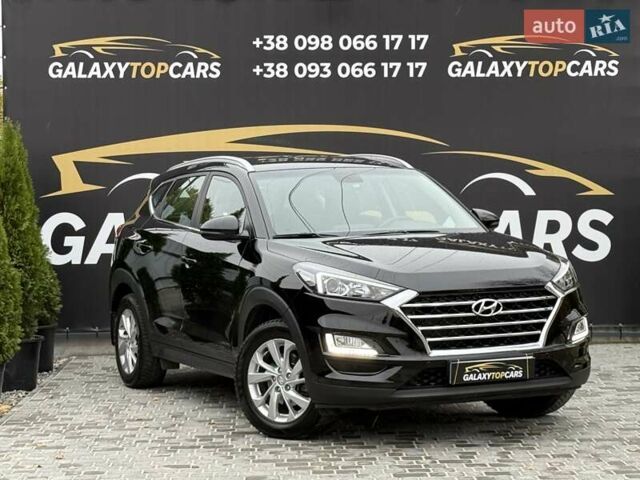 Черный Хендай Туксон, объемом двигателя 2 л и пробегом 77 тыс. км за 21500 $, фото 14 на Automoto.ua