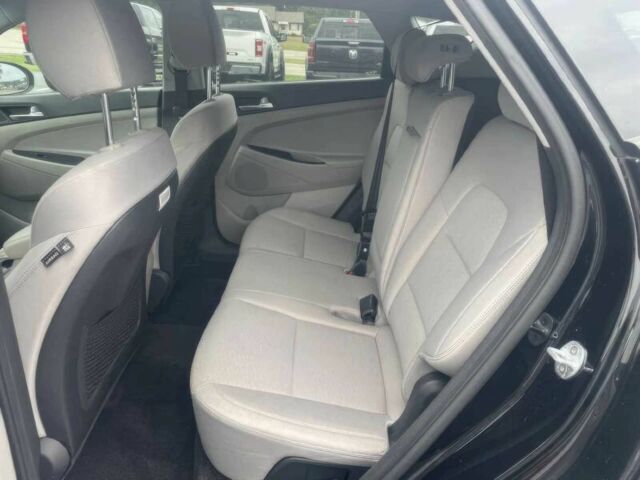 Черный Хендай Туксон, объемом двигателя 2 л и пробегом 38 тыс. км за 10400 $, фото 8 на Automoto.ua