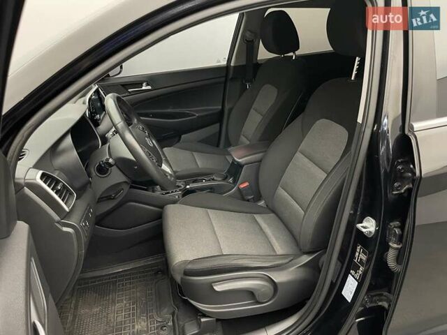 Черный Хендай Туксон, объемом двигателя 2 л и пробегом 100 тыс. км за 22424 $, фото 9 на Automoto.ua