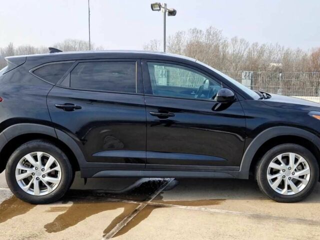 Черный Хендай Туксон, объемом двигателя 2 л и пробегом 76 тыс. км за 11200 $, фото 4 на Automoto.ua