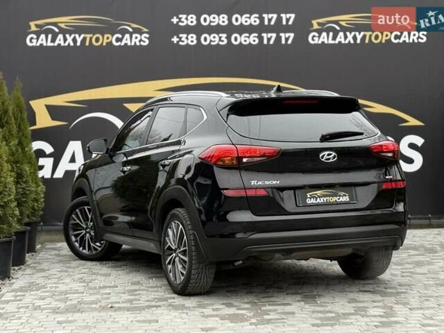 Черный Хендай Туксон, объемом двигателя 2 л и пробегом 55 тыс. км за 22300 $, фото 24 на Automoto.ua