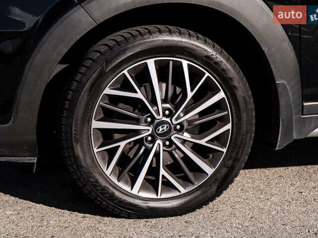Черный Хендай Туксон, объемом двигателя 2 л и пробегом 88 тыс. км за 23000 $, фото 9 на Automoto.ua