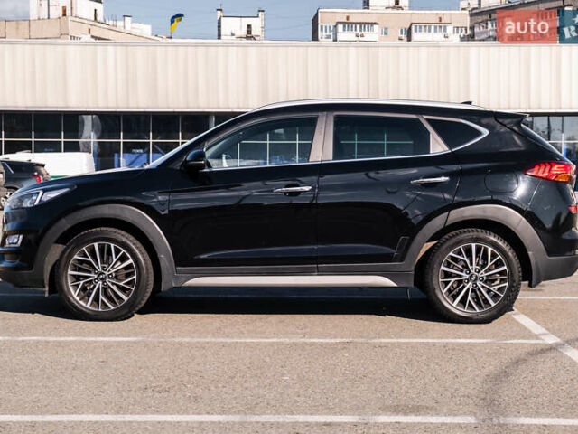 Черный Хендай Туксон, объемом двигателя 2 л и пробегом 88 тыс. км за 23000 $, фото 4 на Automoto.ua