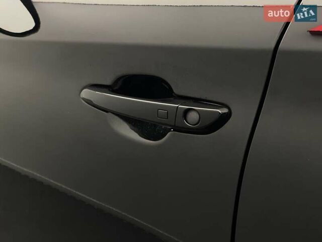 Черный Хендай Туксон, объемом двигателя 2 л и пробегом 100 тыс. км за 22424 $, фото 7 на Automoto.ua