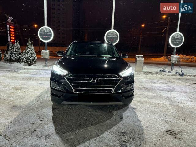 Черный Хендай Туксон, объемом двигателя 2 л и пробегом 86 тыс. км за 31000 $, фото 4 на Automoto.ua