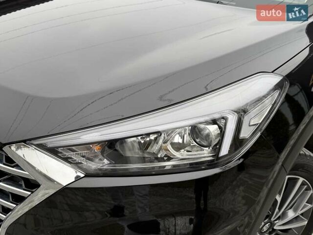 Черный Хендай Туксон, объемом двигателя 2 л и пробегом 55 тыс. км за 22300 $, фото 13 на Automoto.ua