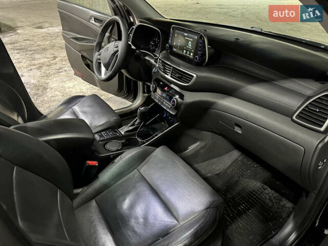 Черный Хендай Туксон, объемом двигателя 2 л и пробегом 86 тыс. км за 31000 $, фото 16 на Automoto.ua