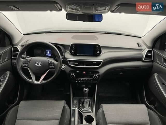 Черный Хендай Туксон, объемом двигателя 2 л и пробегом 100 тыс. км за 22424 $, фото 10 на Automoto.ua