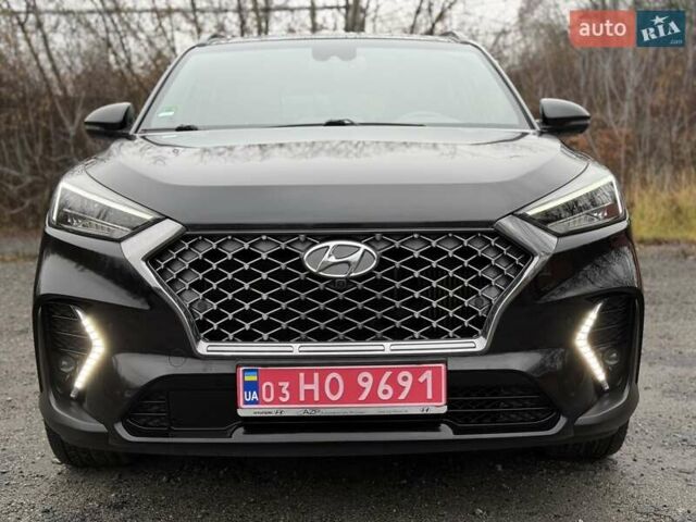 Черный Хендай Туксон, объемом двигателя 2 л и пробегом 98 тыс. км за 25900 $, фото 2 на Automoto.ua