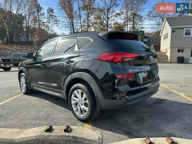 Черный Хендай Туксон, объемом двигателя 2 л и пробегом 125 тыс. км за 4300 $, фото 1 на Automoto.ua