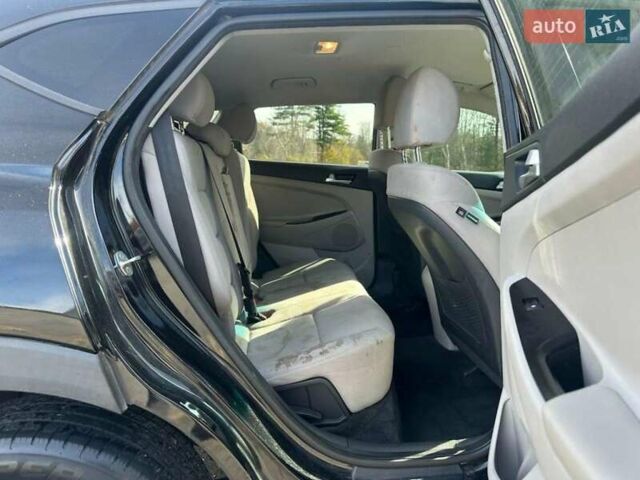 Черный Хендай Туксон, объемом двигателя 2 л и пробегом 125 тыс. км за 4300 $, фото 8 на Automoto.ua