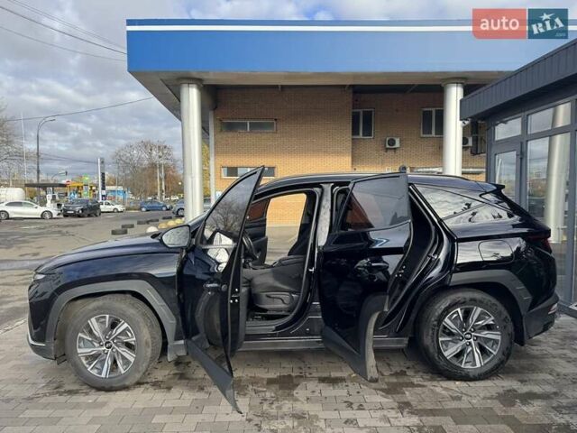 Черный Хендай Туксон, объемом двигателя 2 л и пробегом 126 тыс. км за 24000 $, фото 5 на Automoto.ua